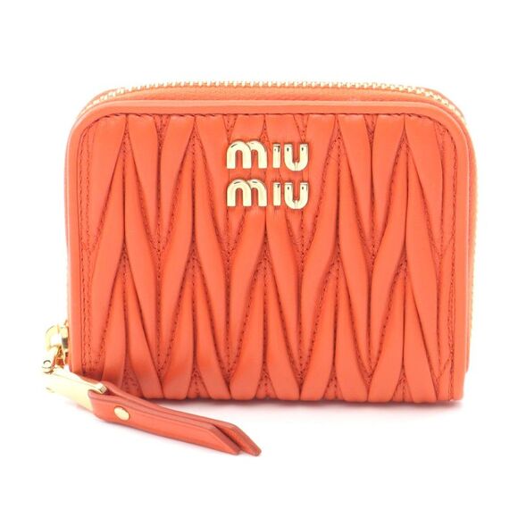 Miu Miu Handbags - Miu Miu Leather Matelassé Coin Case Orange